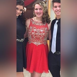 Red Jovani hoco/formal dress! Size 10. Worn once! Silver beading and open back!